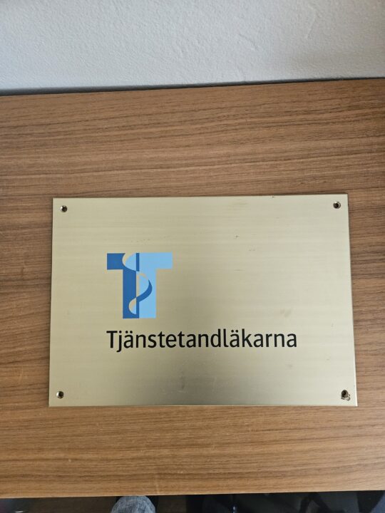 Tjänstetandläkarnas skylt